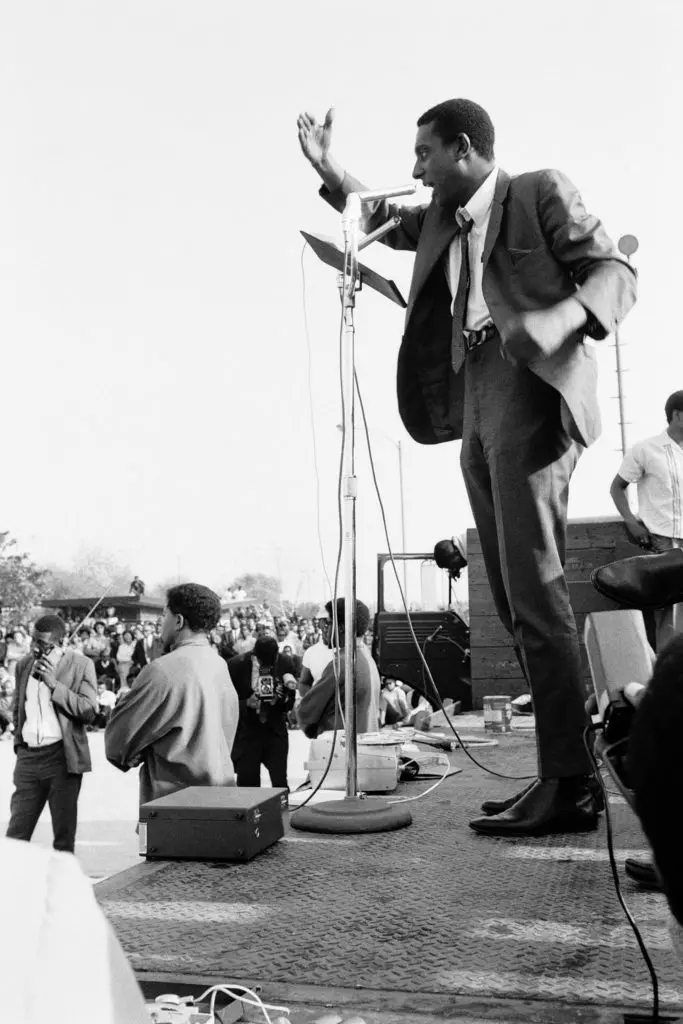 Gordon Parks' "Untitled, Los Angeles, California," 1966. The image shows Carmichael addressing the Watts crowd from a truck bed. (Courtesy The Gordon Parks Foundation)