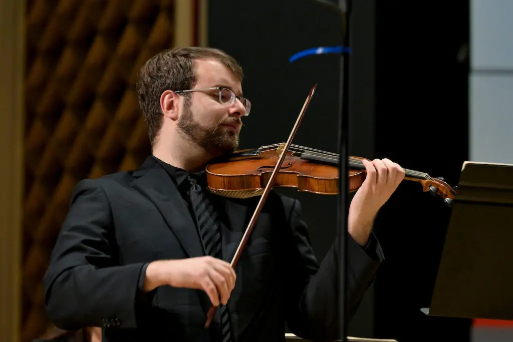 Violinist Jacob Schafer performing at the Bach Society Houston Christmas Oratorio at Brockman Hall for Opera at Rice University. (Photo by Maria Lysaker)