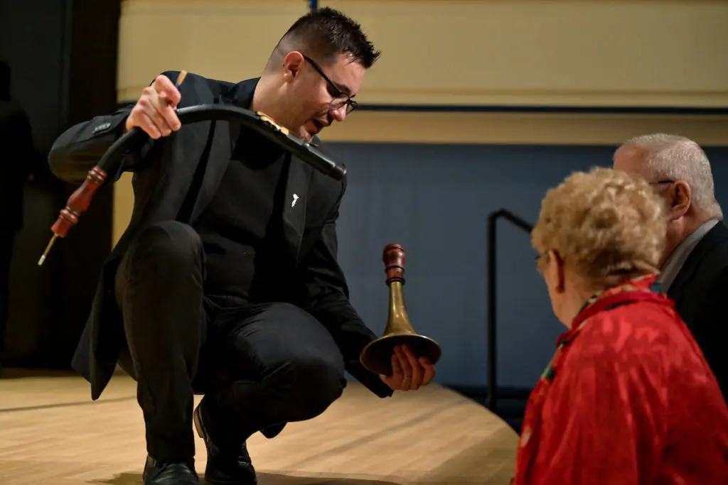 Pablo Moreno explains the Oboe da Caccia at the Bach Society Houston Christmas Oratorio at Brockman Hall for Opera at Rice University. (Photo by Maria Lysaker)
