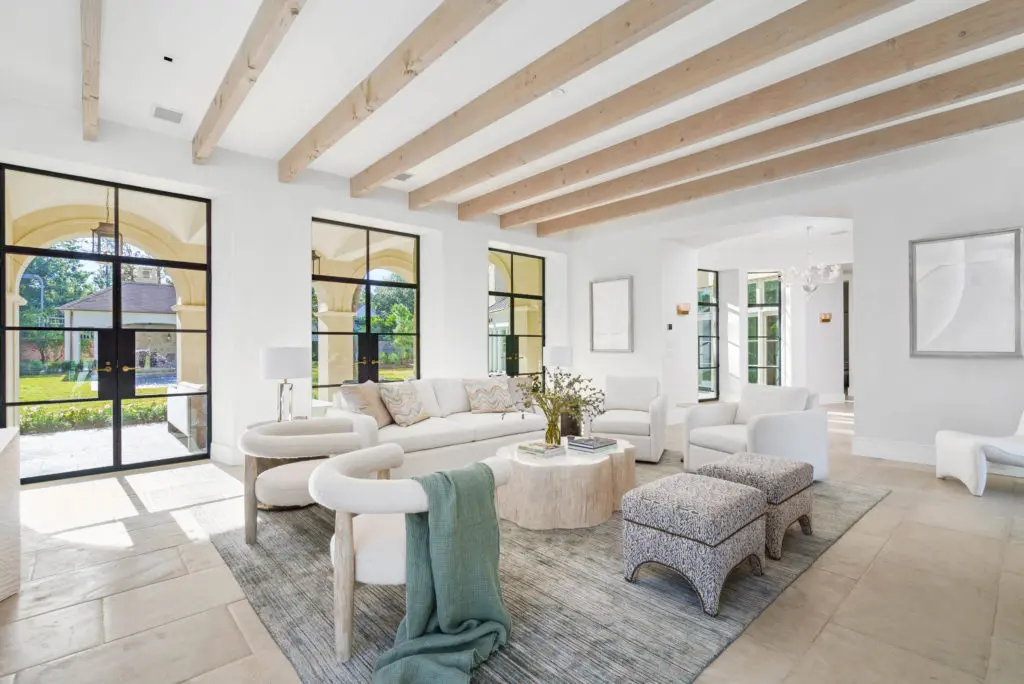 Another view of the main salon at 2445 Pine Valley Court in River Oaks with views to the grand rear garden. (Photo by Sonya Bertolino)