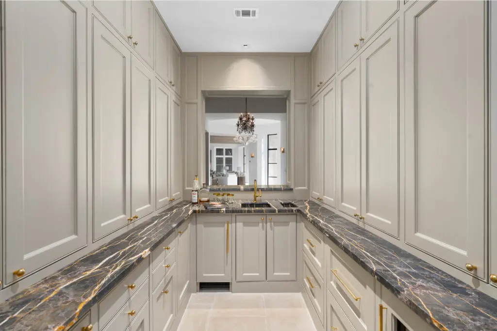 The wet bar at 2445 Pine Valley Court offers ample storage. (Photo by Sonya Bertolino)