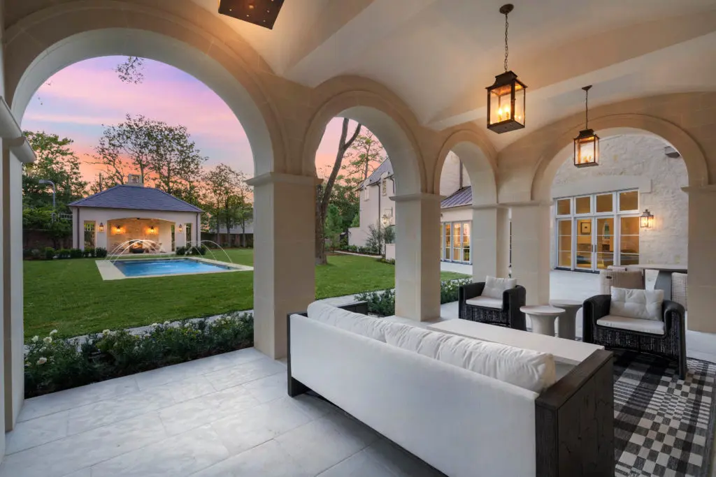 Al fresco entertaining offers garden views from the loggia located off of the main salon at 2445 Pine Valley Court. (Photo by Sonya Bertolino)