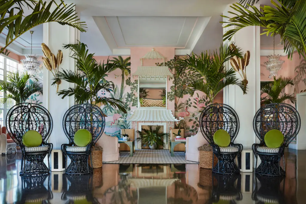 A 2020 redo of the Colony Hotel lobby includes custom pink de Gournay wallpaper. (photo by Carmel Brantley)