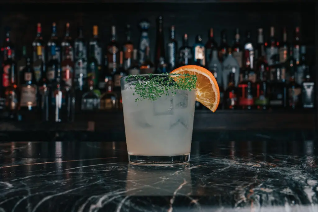 Mixologist Jessica Wells is behind the bar crafting cocktails from the everyday to the out of the ordinary.  (Photo by Raydon Creative)