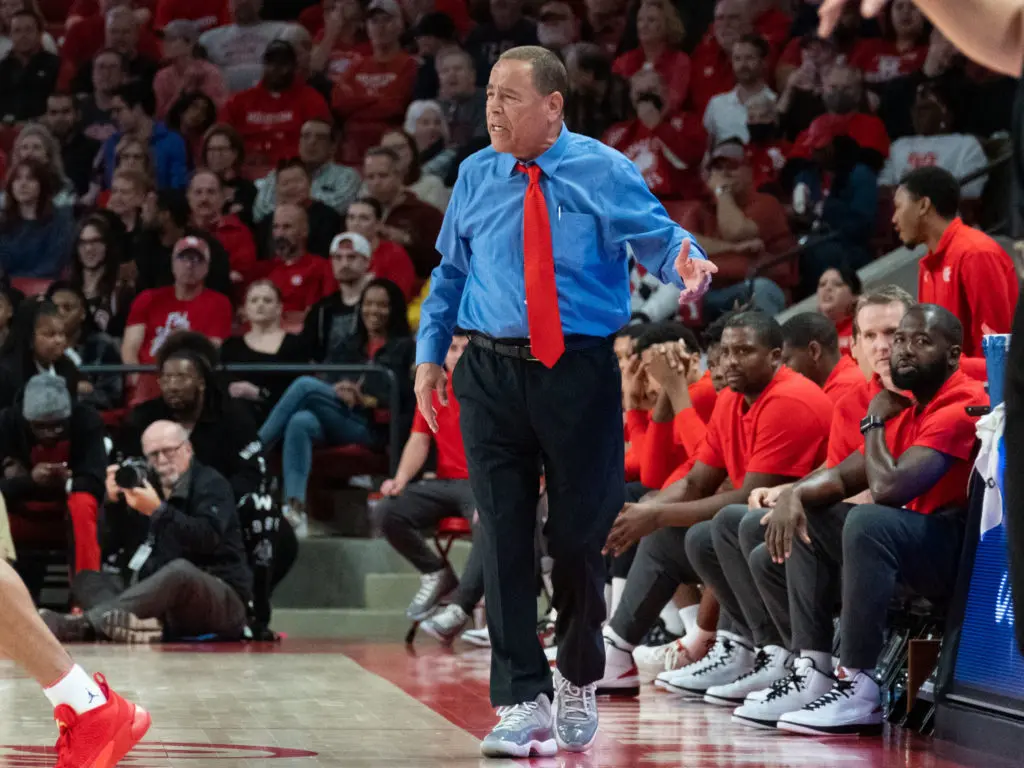 University of Houston coach Kelvin Sampson brought back the coat and tie for suit and sneakers day. (Photo by F. Carter Smith)