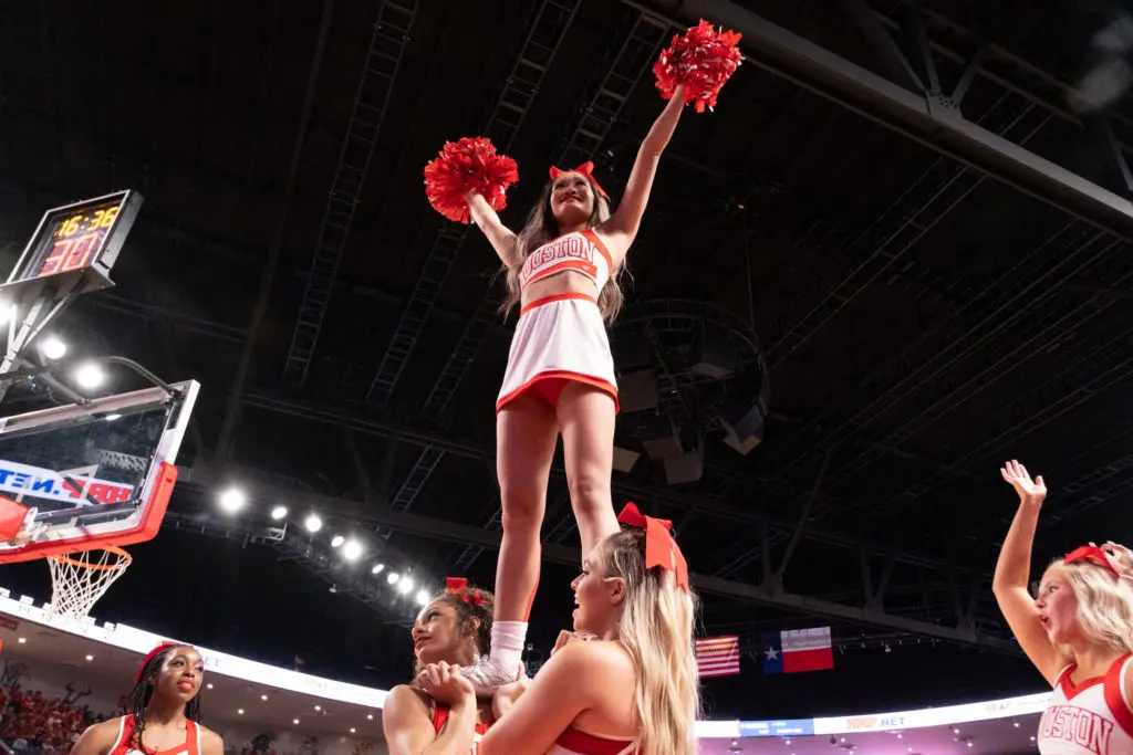 University of Houston's cheerleaders add plenty to the Fertitta Center atmosphere. (Photo by F. Carter Smith)