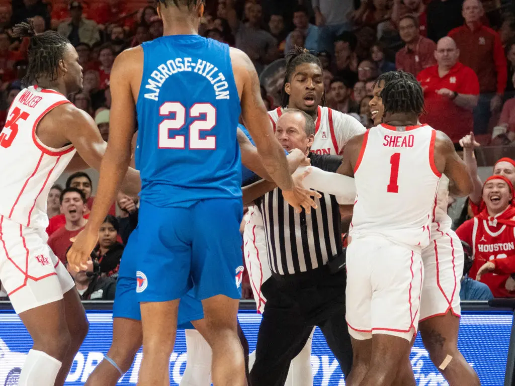 UH and SMU had a little skirmish after a hard foul. But cooler heads prevailed. (Photo by F. Carter Smith)