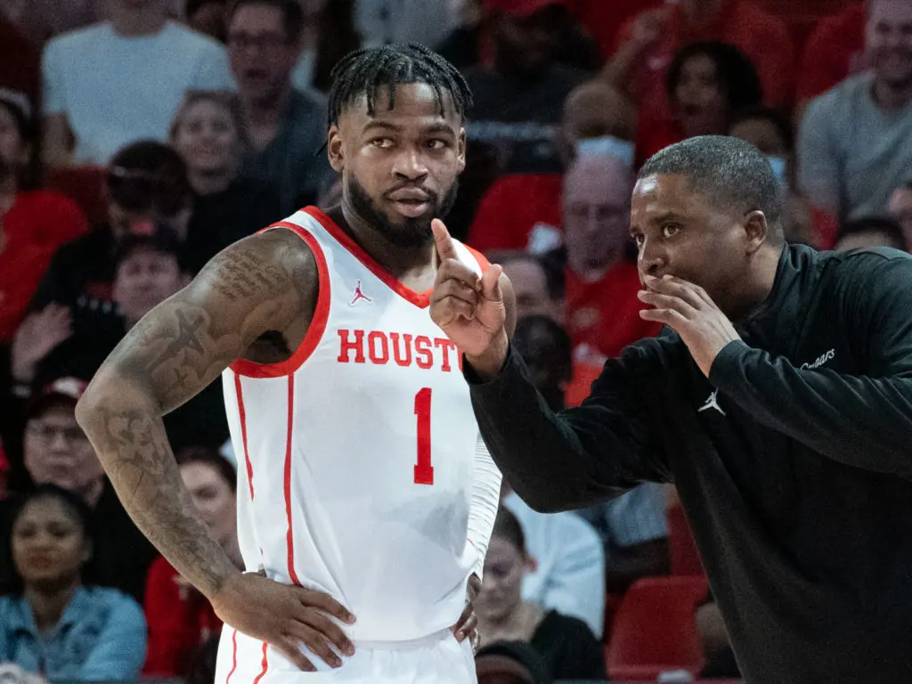 Point guard Jamal Shead and University of Houston assistant coach Quannas White have a bond. (Photo by F. Carter Smith)