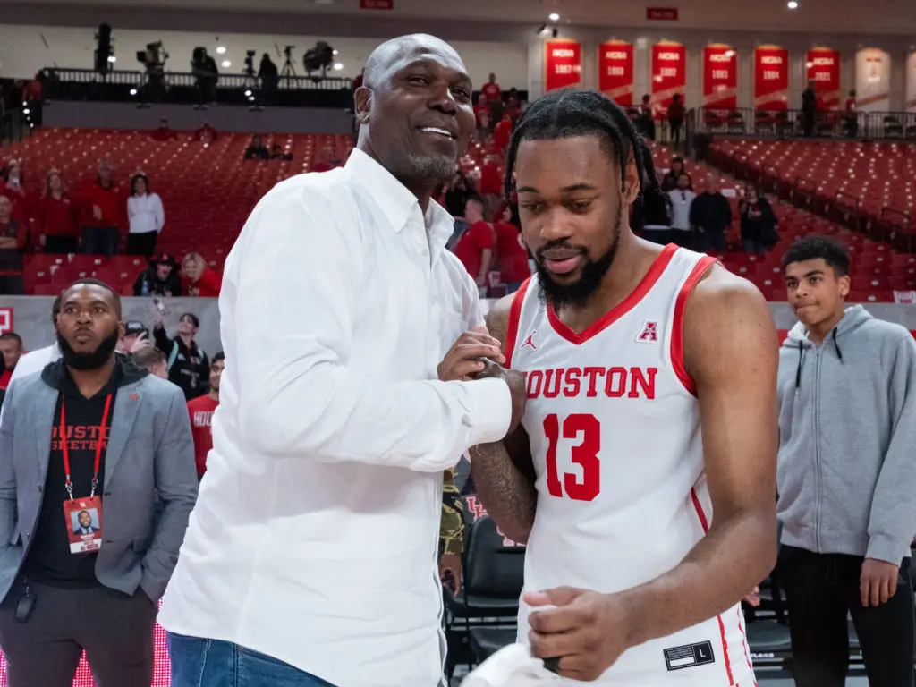 Hakeem Olajuwon, one of the greatest players in UH and NBA history, sees plenty to love in undersized UH big man J'Wan Roberts. (Photo by F. Carter Smith)