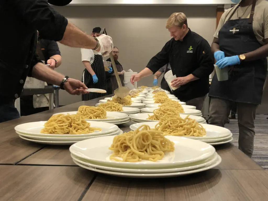 A  view of the kitchen at last year's Chefs for Paws event. Collaborating chefs work to put out a memorable multi-course meal.