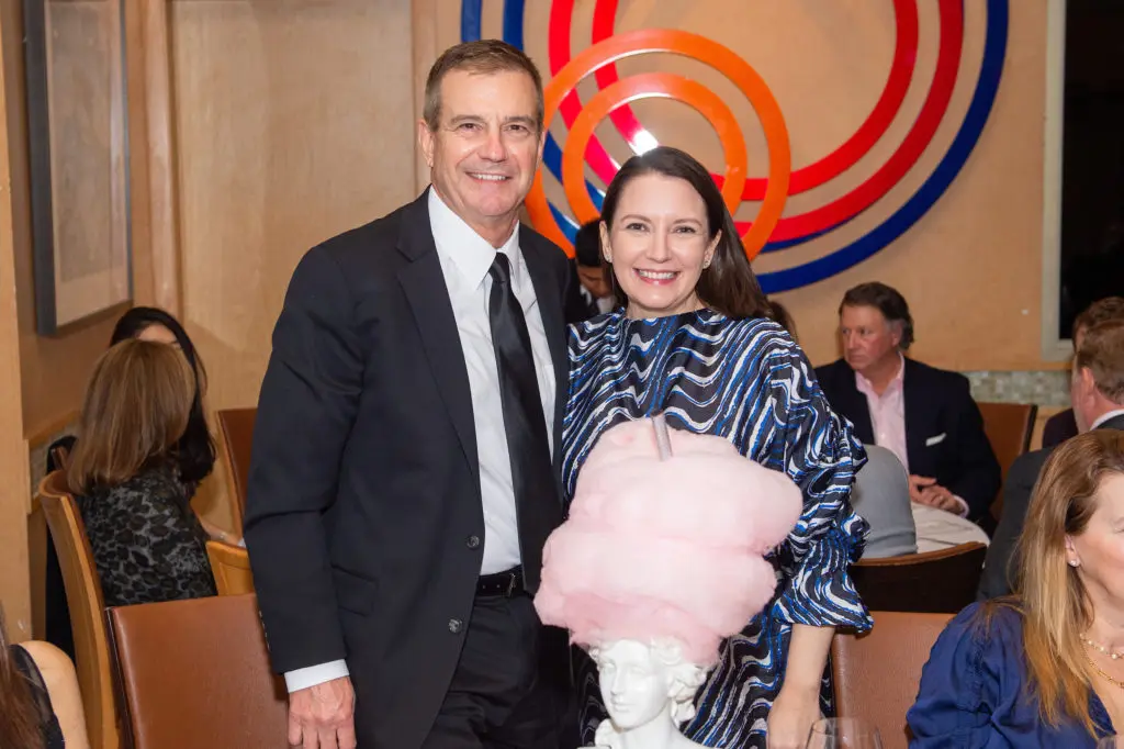 Wine raffle winner Mark Alsop and CanCare president and CEO Darcie Wells at Tony's. (Photo by Jacob Power)