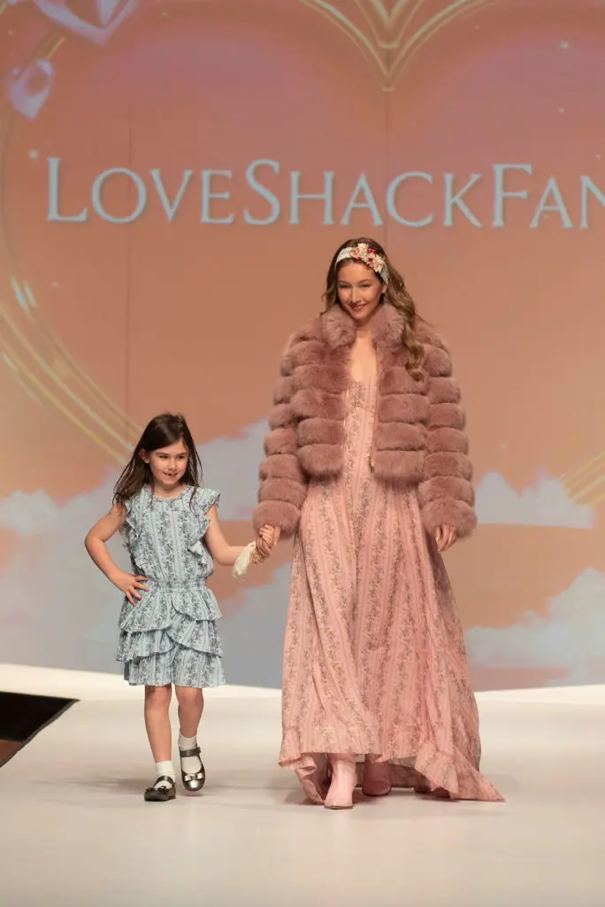 LoveShackFancy models on the runway (Photo by Tamytha Cameron)