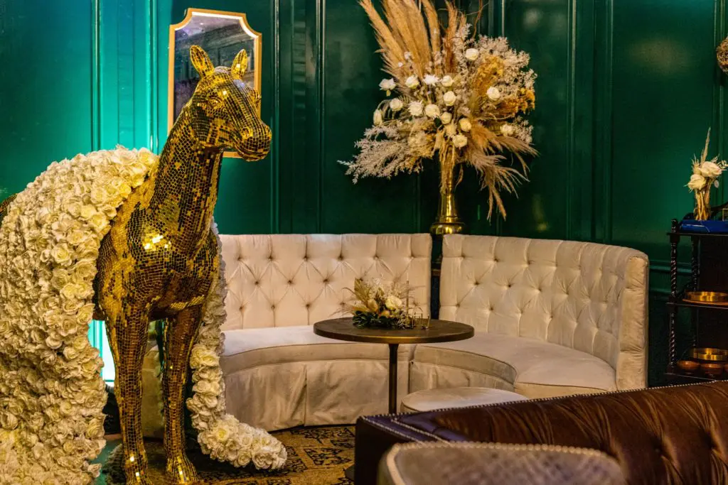 The 7-foot tall gold mosaic pony in the VIP Gold Key lounge at Cotton Holding's Houston Livestock Show & Rodeo barbecue cook-off party. (Photo courtesy of Cotton Holdings)