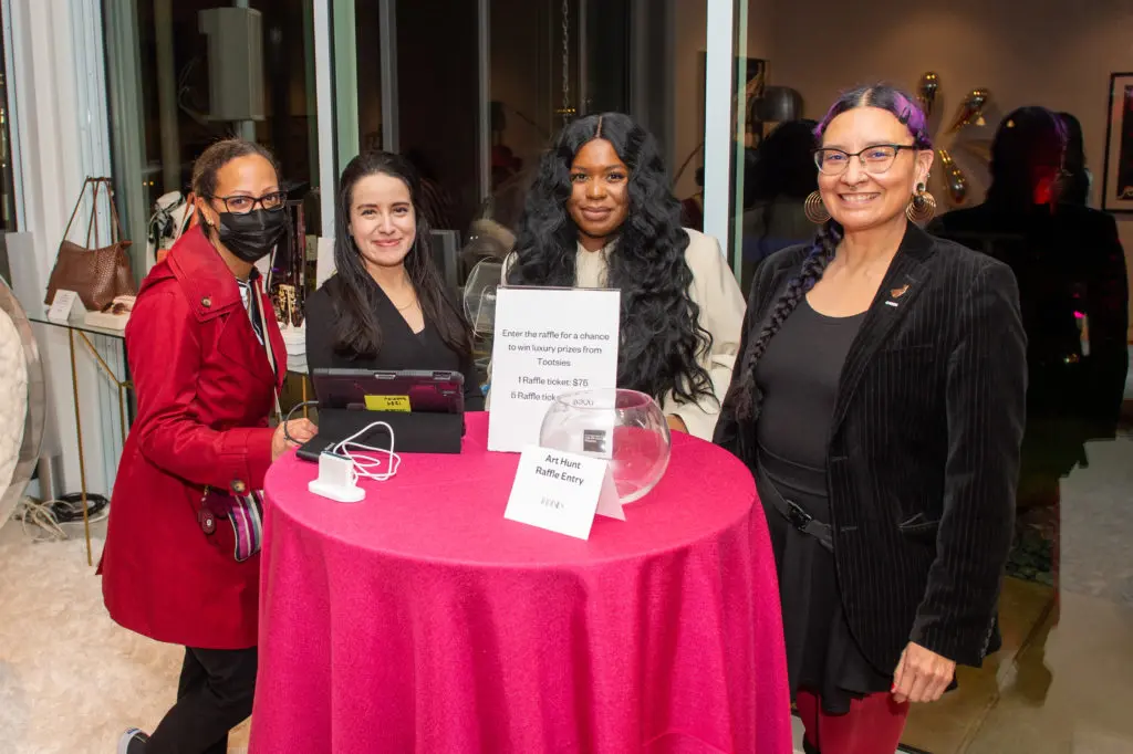 Fabulous women ran the raffle at CAMH Another Great Night. (Photo by Jacob Powers)