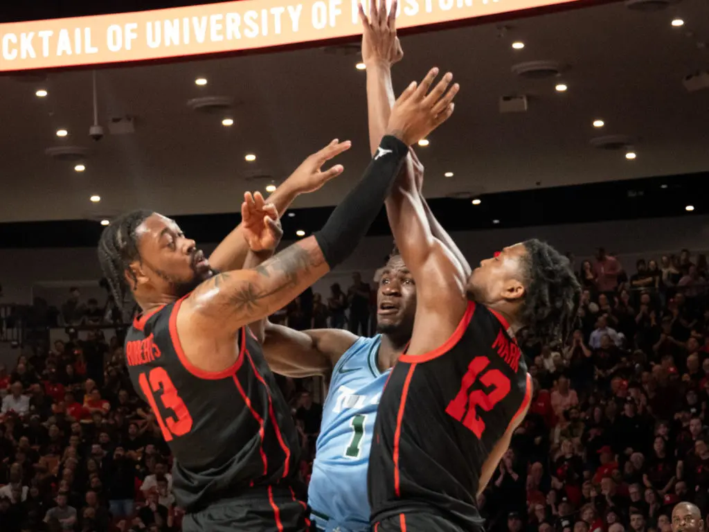 J'Wan Roberts and Tramon Mark know that defense makes a major difference for this UH team. (Photo by F. Carter Smith)