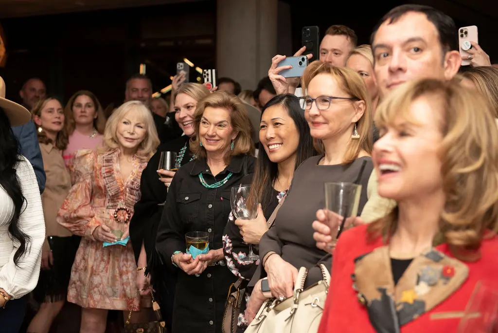 Guests excitedly await the big reveal! (Photo by Tamytha Cameron)