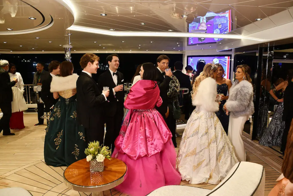 Mardi Gras partying aboard Tilman Fertitta's superyacht, 'Boardwalk' at the San Luis Salute in February. (Photo by Dave Rossman)