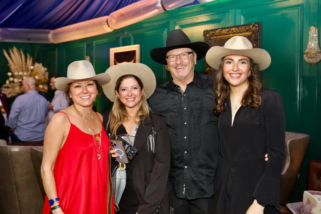 Samantha Knight, Lauren Halle, Bill Sisson, Madine Dill at the Cotton Q Club at the Rodeo Houston barbecue cook-off. (Photo by Ashley Patranella, Painted Peacock Photography)