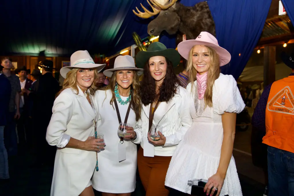 Sanette Austin, Michelle Brady, Stacey White, Chasity Spiller at the Cotton Q Club at the Rodeo Houston barbecue cook-off. (Photo by Ashley Patranella, Painted Peacock Photography)