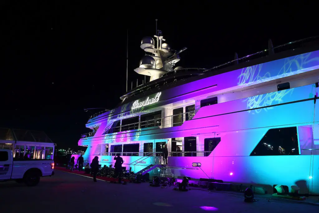 Tilman Fertitta's $150 million, 77-meter yacht 'Boardwalk' welcoming San Luis Salute Mardi Gras VIPs in February. (Photo by Dave Rossman)