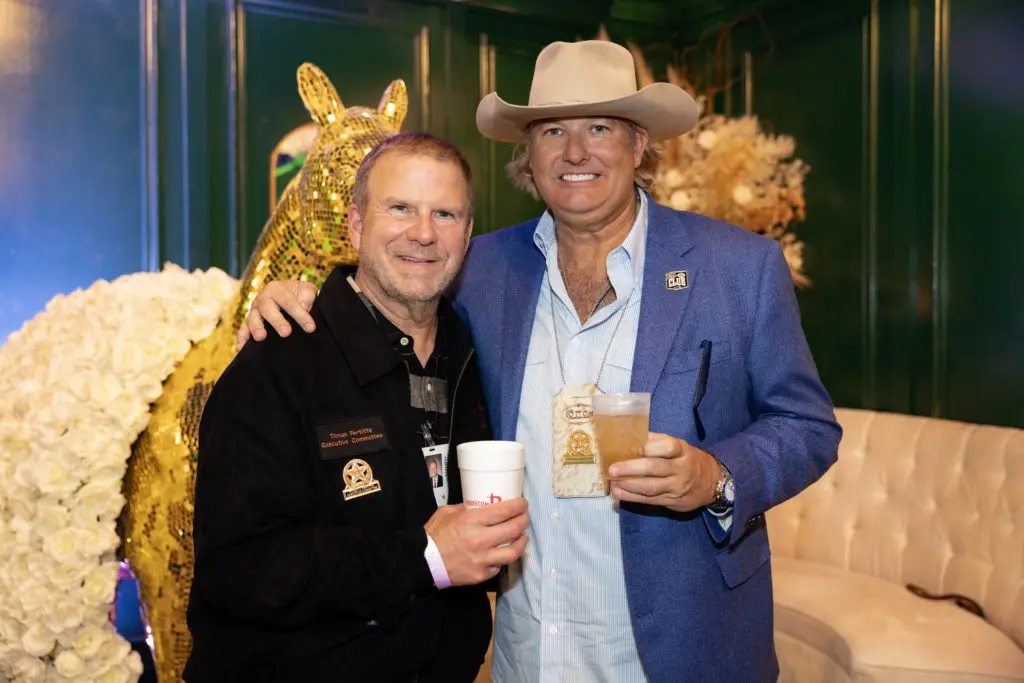 Landry's owner Tilman Fertitta, Cotton Holdings founder and CEO Pete Bell at the Cotton Q Club at the HLS&R barbecue cook-off. (Photo courtesy of Cotton Holdings)