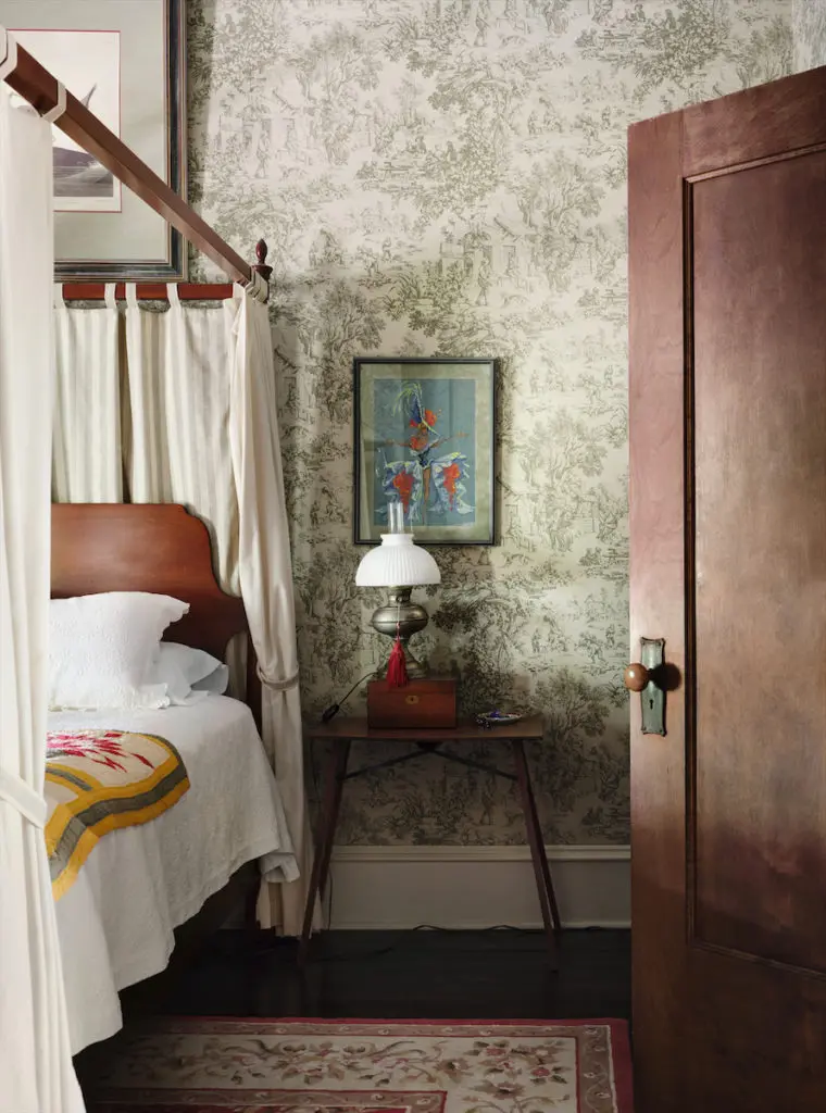 In a guest bedroom, a costume sketch by Winn Morton. (Photo by Lisa Petrole)