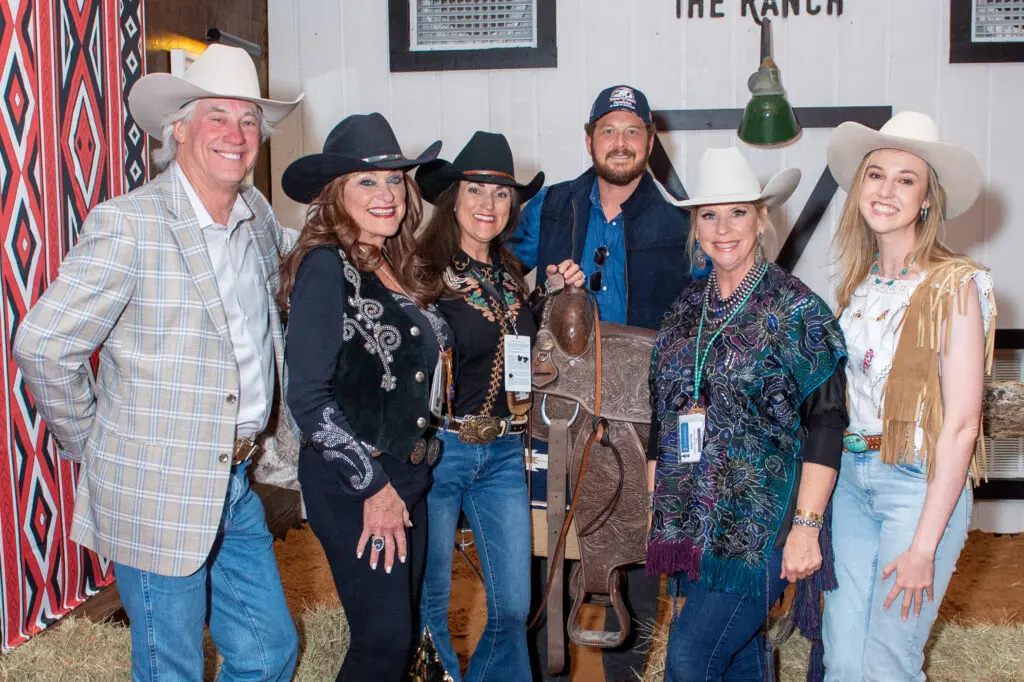Cole Hauser, Yellowstone's Rip Wheeler, surrounded by paying guests during a photo op at The Ranch at the Houston Livestock Show and Rodeo. (Photo by Wilson Parish)