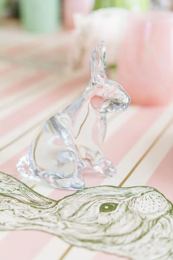 Add a glass rabbit next to each setting for a whimsical touch.