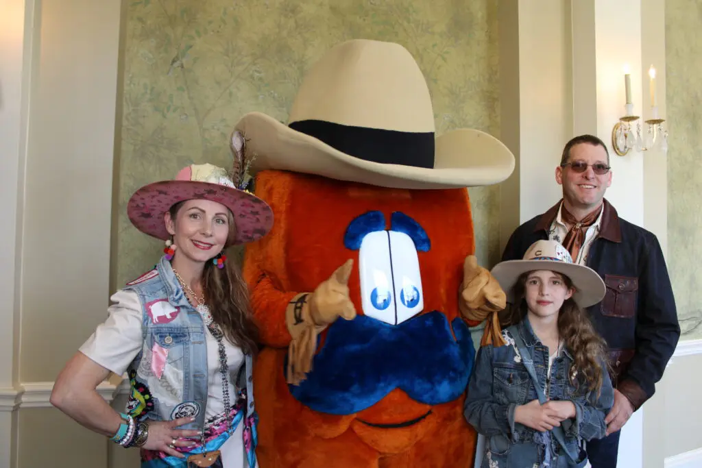 Chadisty Pauly, Howdy, Finley Pauly, Randy Pauly at the HLS&R International Committee Ladies' luncheon at River Oaks Country Club. (Photo by courtesy of HLSR)