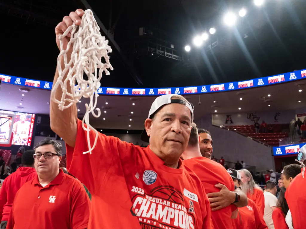 UH coach Kelvin Sampson knows how to cut down nets.  (Photo by F. Carter Smith)