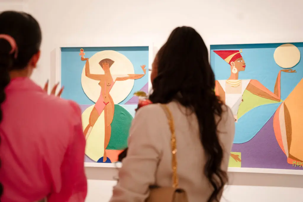 Taking in the art at "Colorful Wave, White Sea" dinner at W.A.A.S. Gallery (Photo by Demetri Sheffield)