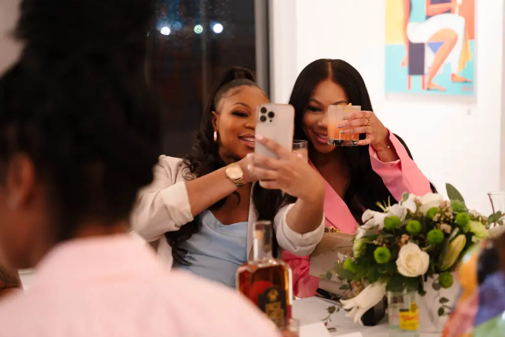 Elizabeth Anera, Rosemary Anera at "Colorful Wave, White Sea" dinner at W.A.A.S. Gallery (Photo by Demetri Sheffield)