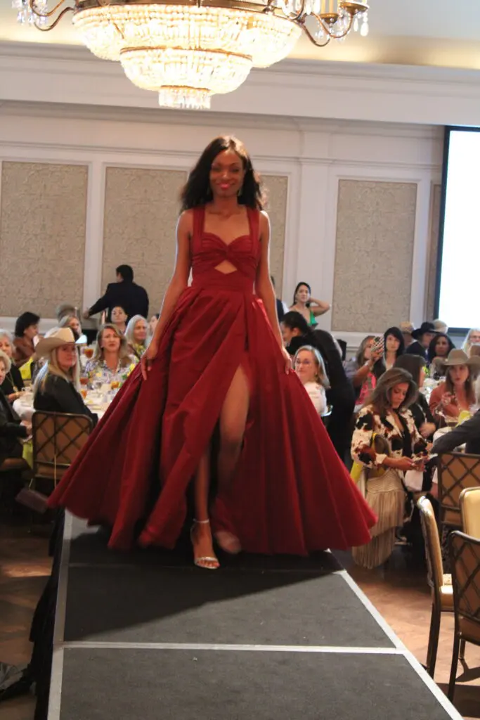 Fashions from Elizabeth Anthony on the catwalk at the HLS&R International Committee Ladies' luncheon at River Oaks Country Club. (Photo by courtesy of HLSR)