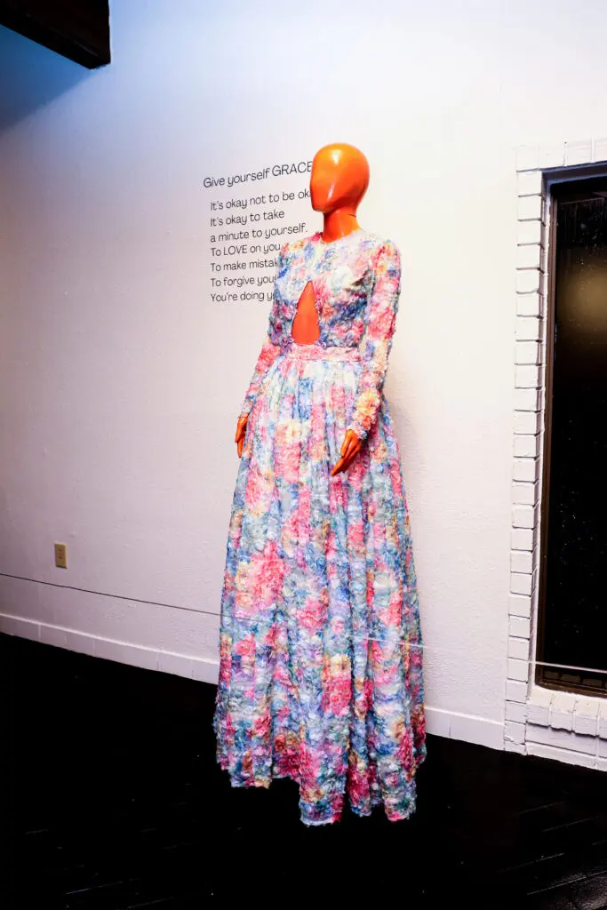 The pieces in Chasity Sereal's "Growing Pains" include long gowns, cocktail dresses, suits, and capes. (Photo by Tye Visuals Photography)