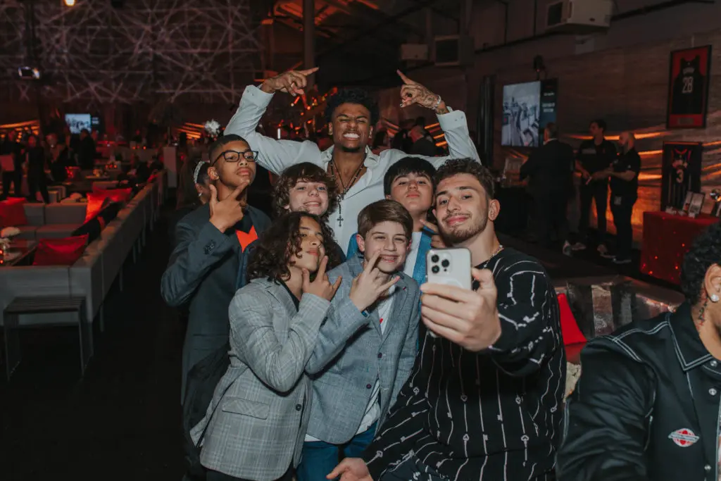 Selfie takers were thrilled to be in the photo with some of the Houston Rickets' young stars.