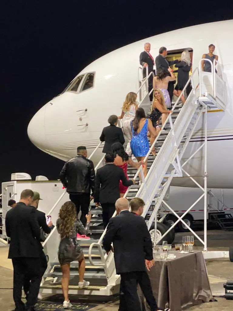 Clutch City Foundation gala guests board the Houston Rockets team jet, a 2019 retrofitted Boeing 767.