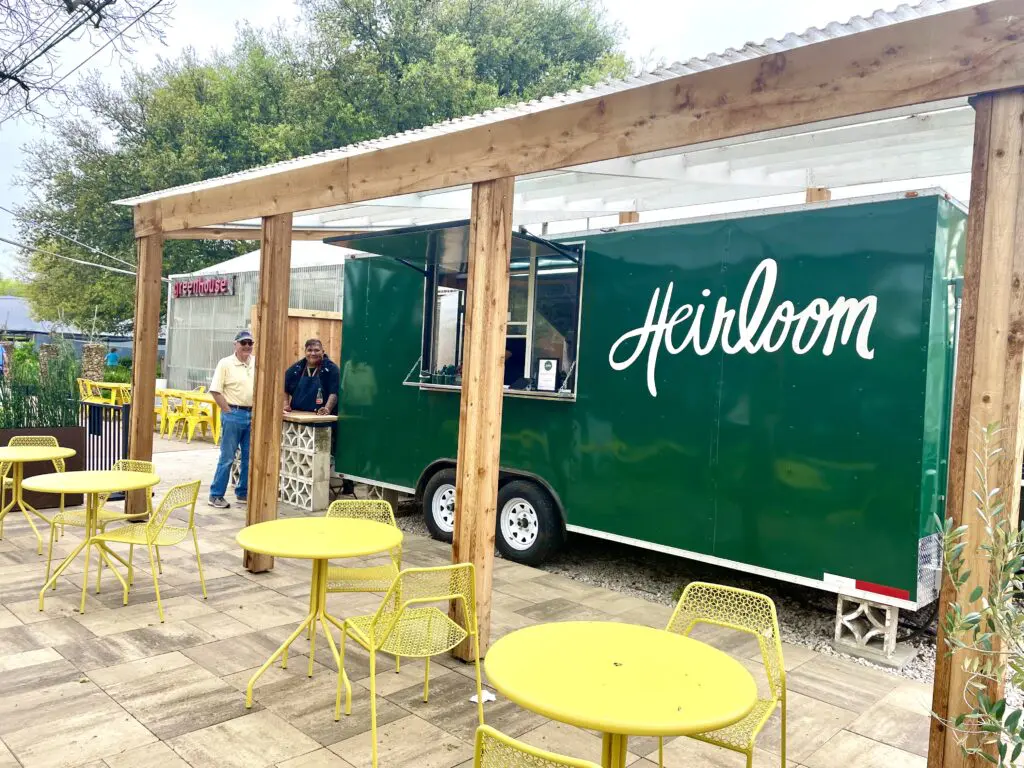 Chef Kevin Martinez (pictured right) welcomes guests to his newest outpost - Heirloom at Archie's Gardenland. (Photo by Courtney Dabney)