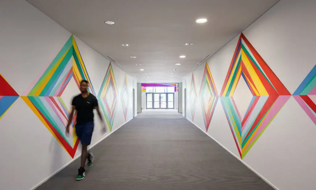 Odili Donald Odita's mural "Meeting Place / Painting with Changing Parts," 2022, at Alice Pratt Brown Hall, commissioned by the Moody Center for the Arts, Rice University (Photo by Sean Fleming)