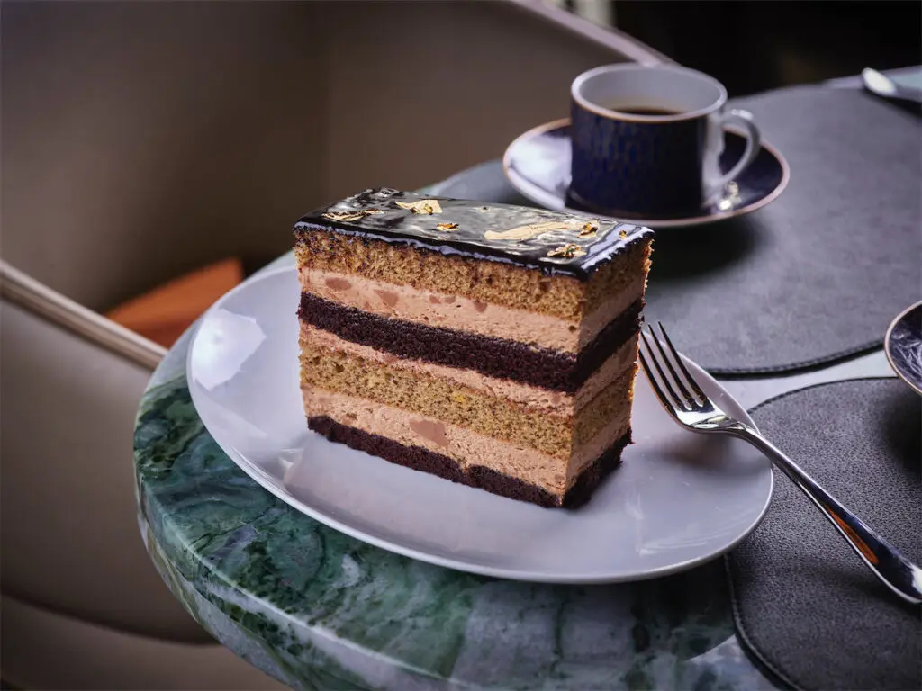 The Society Cake is a decadent chocolate and banana cake creation with gold flakes on top. (Photo by Bill Milne)
