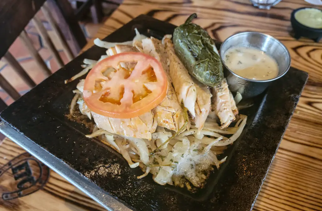 Sizzling chicken fajitas are a menu favorite at El Tiempo, which now has a location at Market Street.