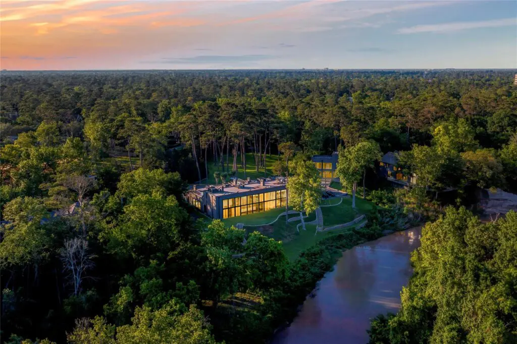 John and Becca Cason Thrash's 20,000-square-foot house is nestled in the trees. (Photo by Joe Bryant / Martha Turner Sotheby’s International Realty)