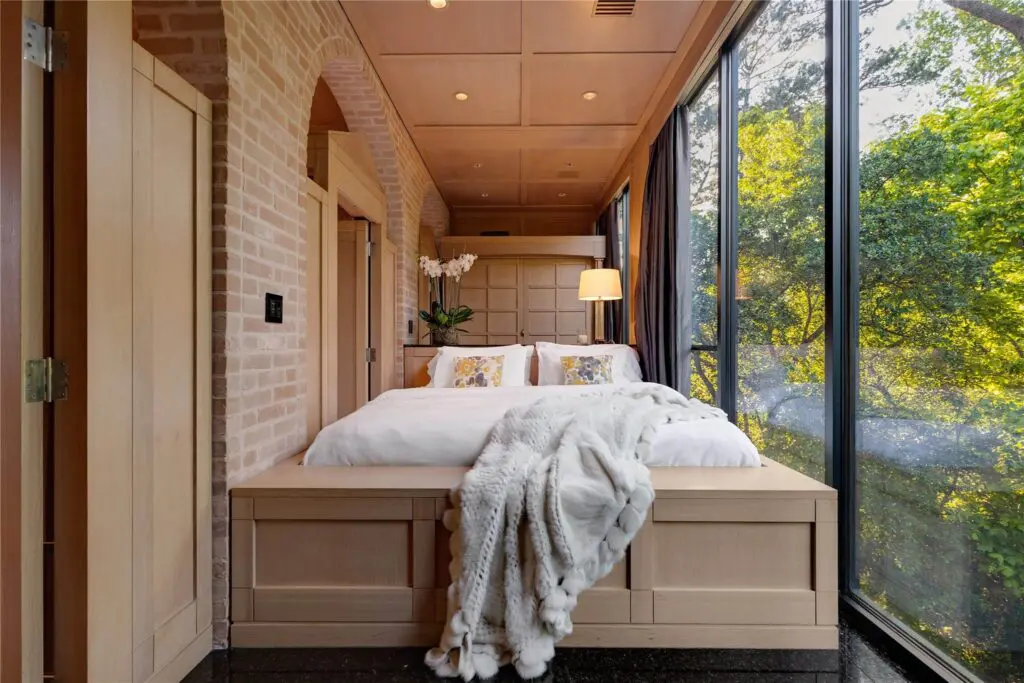 Snuggling up, almost in the trees, is part of the allure of John and Becca Cason Thrash's house. (Photo by Joe Bryant / Martha Turner Sotheby’s International Realty)