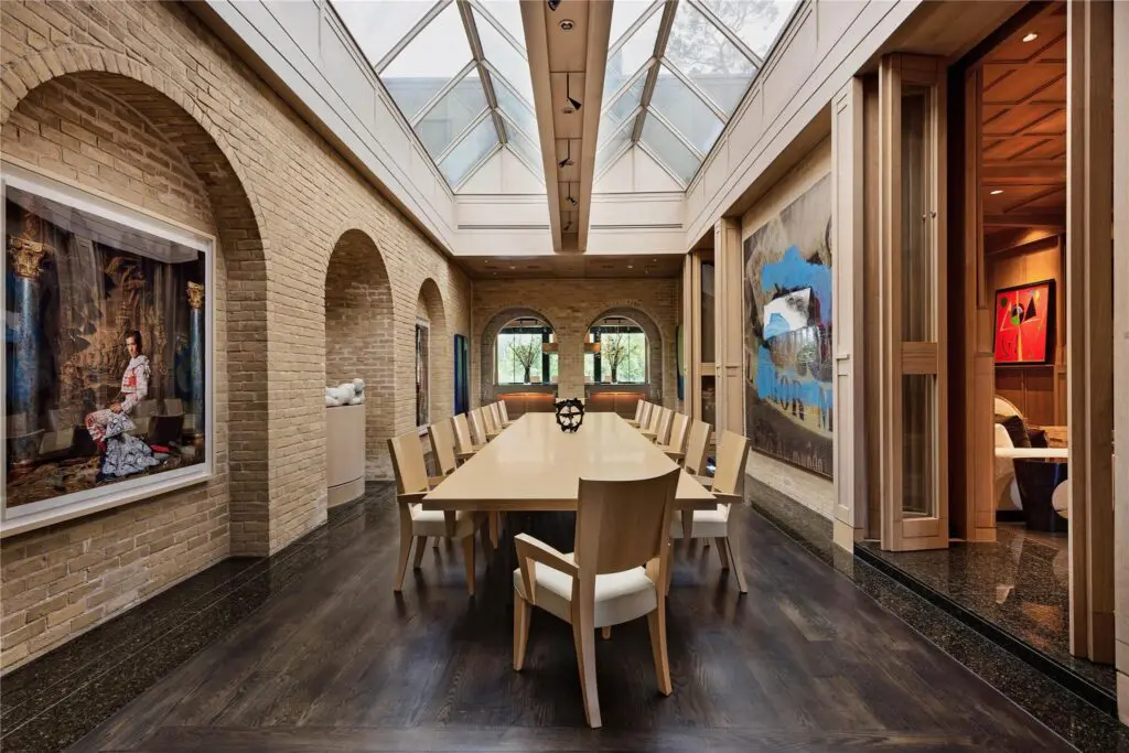 A grand dining room table makes those dinner parties at the house of John and Becca Cason Thrash even more memorable. (Photo by Joe Bryant / Martha Turner Sotheby’s International Realty)