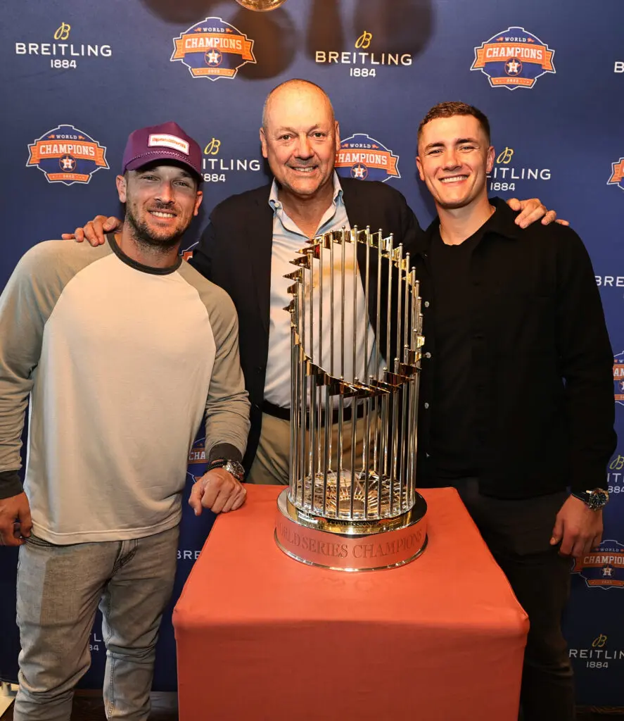 Alex Bregman, Thierry Prissert and Hunter Brown pose with the World Series trophy. (Photo by Bob Levey/Getty Images for Breitling)