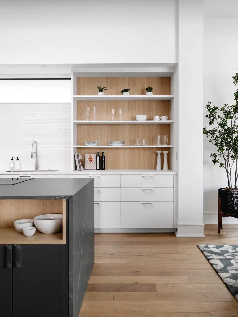 Cesar Rovere Nordico wood infuses natural elements in this contrasted luxury kitchen design. (Photo by Chase Daniel)