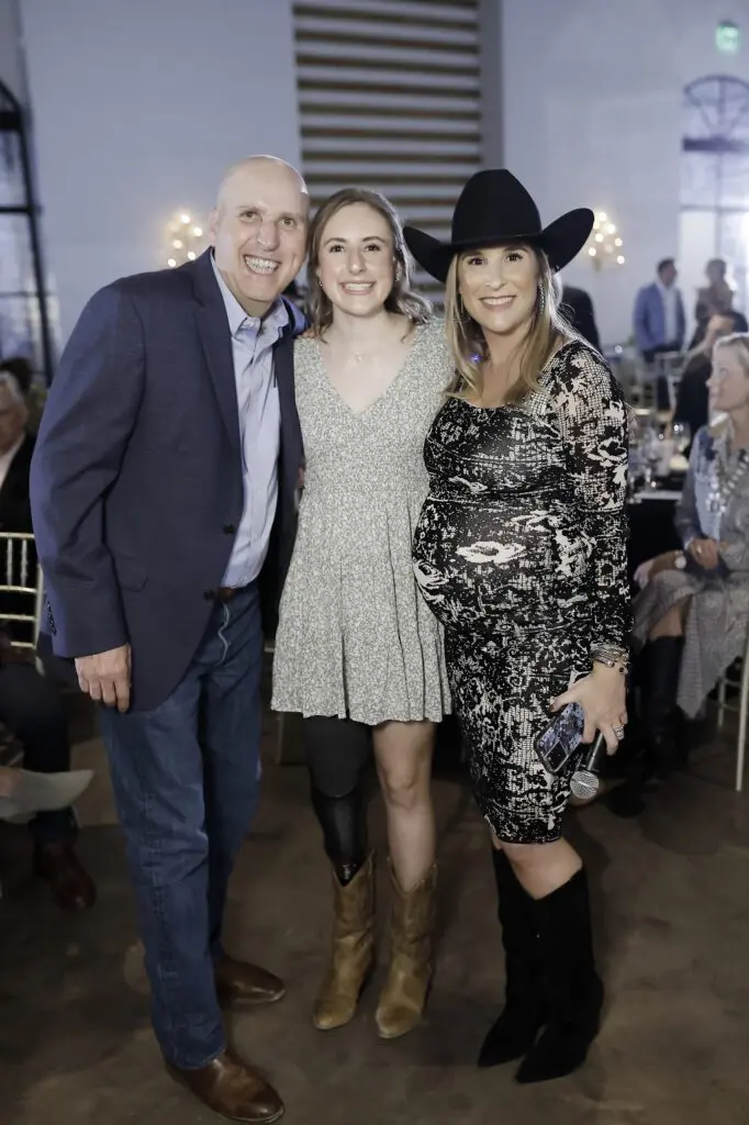 Chip Probe, Cancer Warrior Dylan, and Brittany Hebert Franklin at the Sky High for Kids banquet evening at The Revaire. (Photo by Quy Tran)