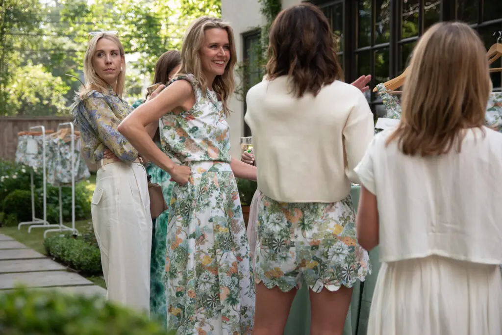 Lyndsey Zorich, owner of The Avenue, conversed with customers and friends at the launch of her new clothing line dubbed Mason's Daughter. 
(Photo by Lance Blade)