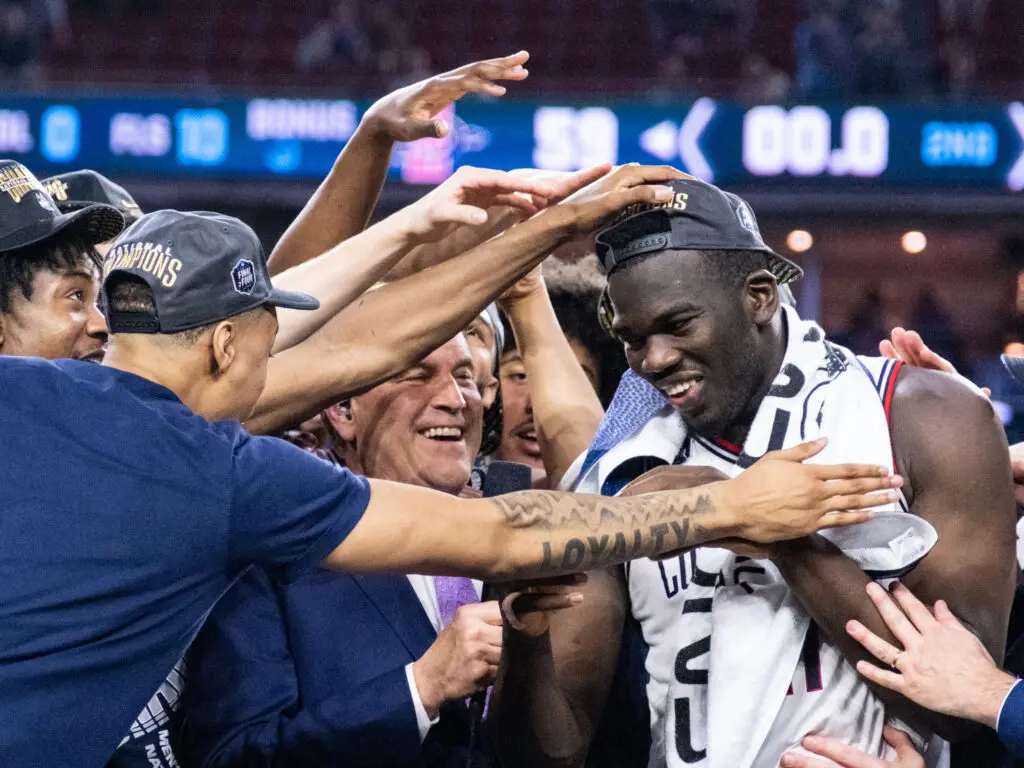 Adama Sanogo received plenty of love after leading UConn to its fifth national championship.  (Photo by F. Carter Smith)