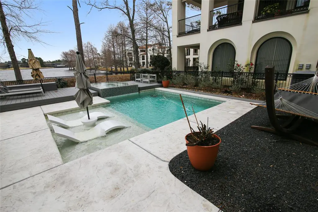 26 Secluded Trail is a waterfront home in The Woodlands with some serious perks.