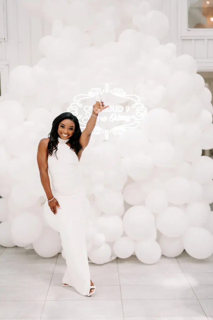 Simone Biles celebrates at her 'On Cloud 9' themed bridal shower at The Juliana in Houston's Heights neighborhood. (Photo by Rachel "Rae Tay" Taylor IG @raetay_photography)